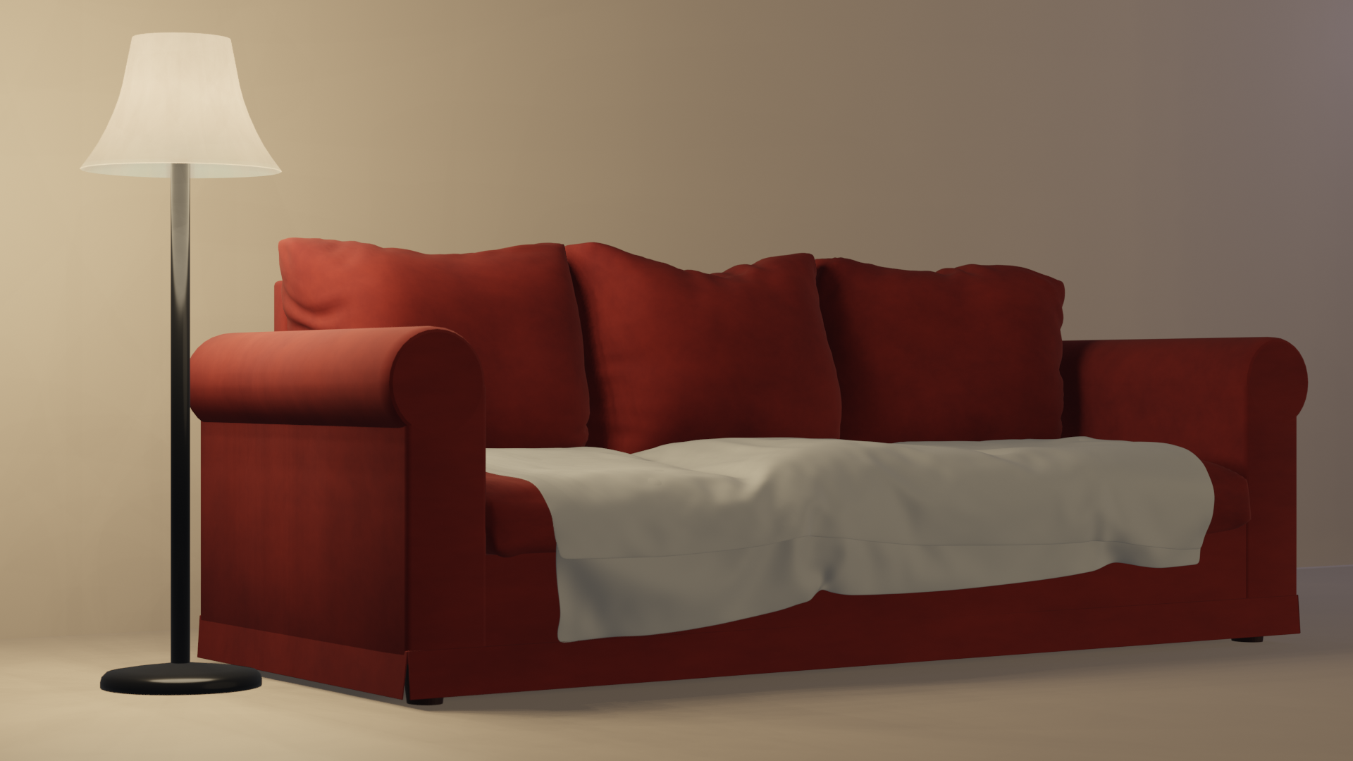 Red couch, with white blanket draped across seat, with standing lamp